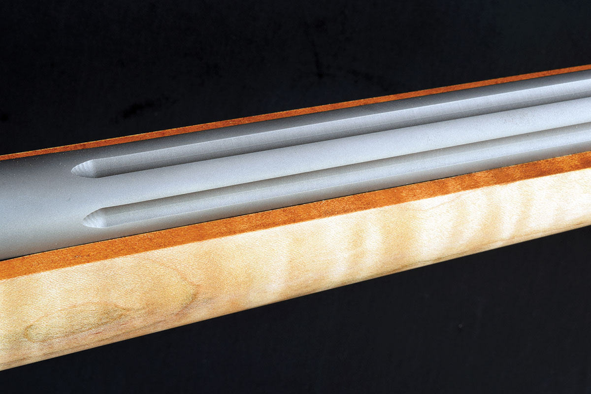 Fluting trims ounces, requires thicker barrel walls than are practicable on the lightest unfluted barrels.